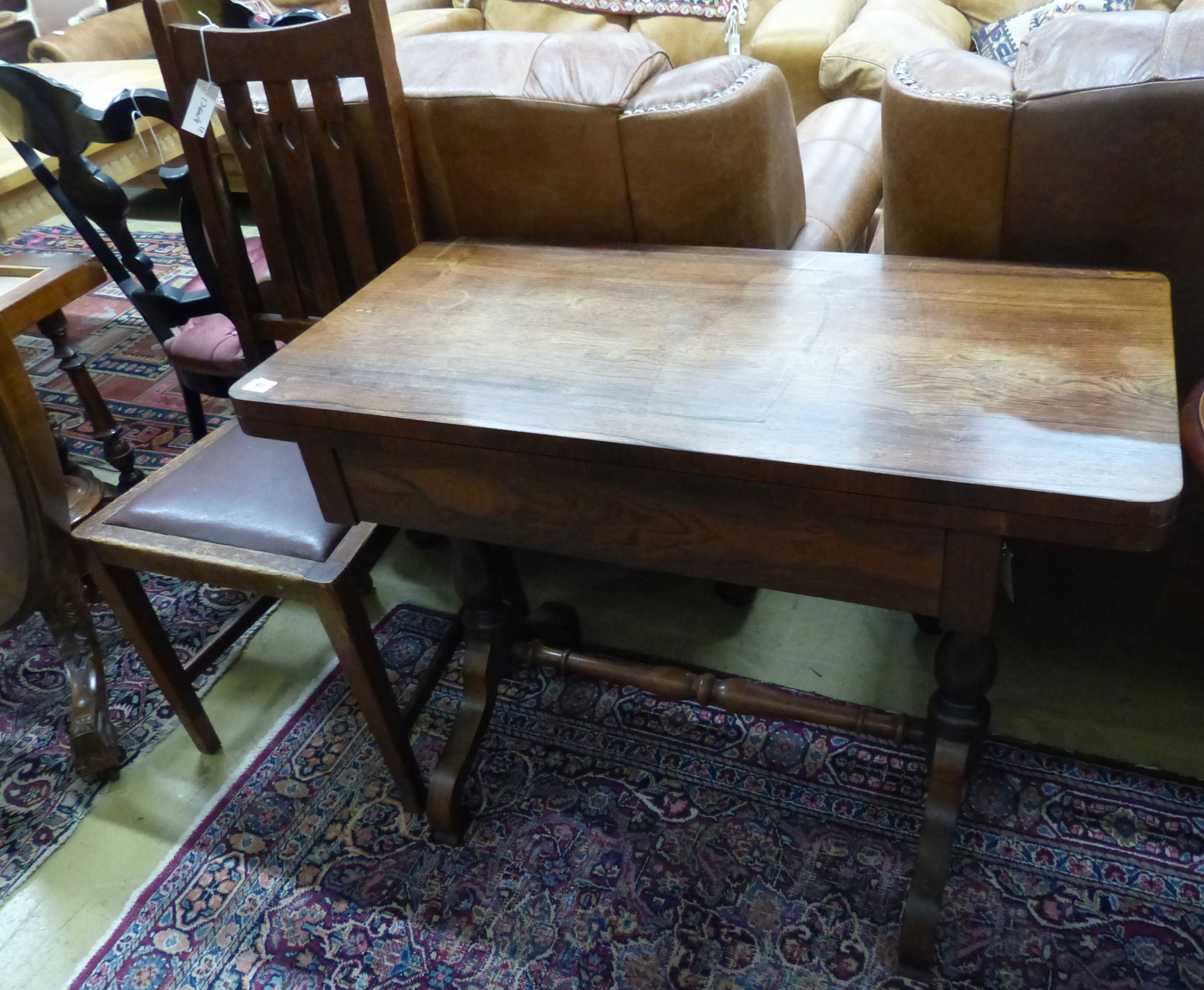 A Victorian rosewood rectangular folding card table, W.91cm D.45cm H.73cm, and an Arts and Crafts oak dining chair